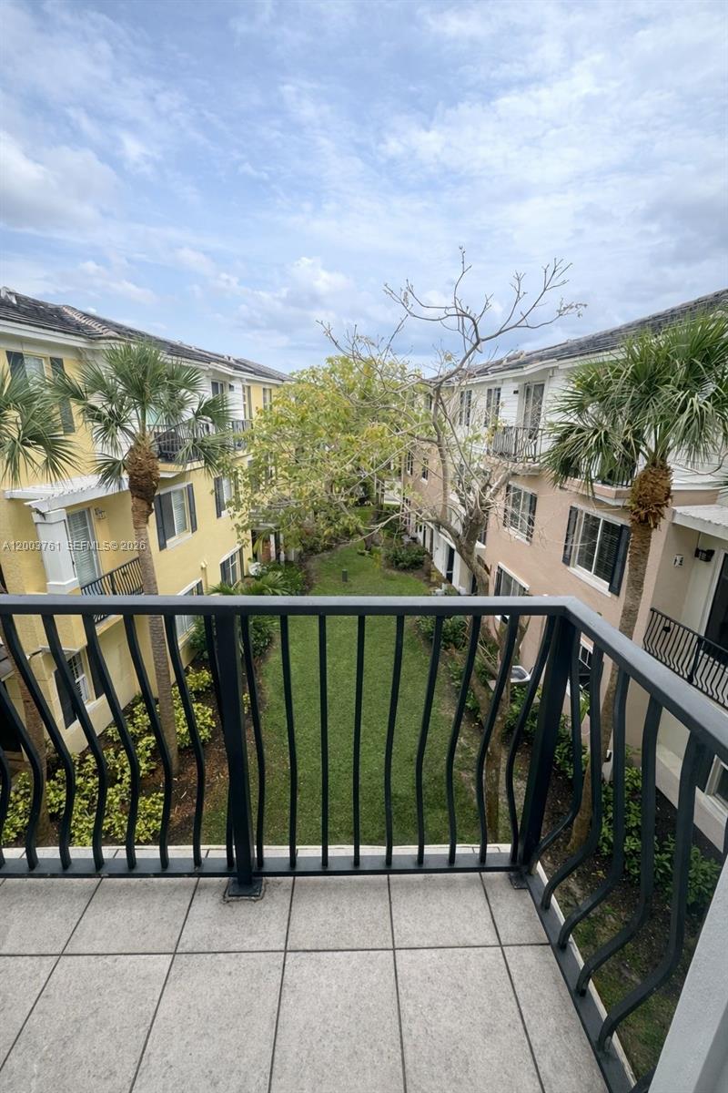 556 North West 39th Circle Boca Raton, FL 33431 - Photo 2 of 19 a view of a balcony