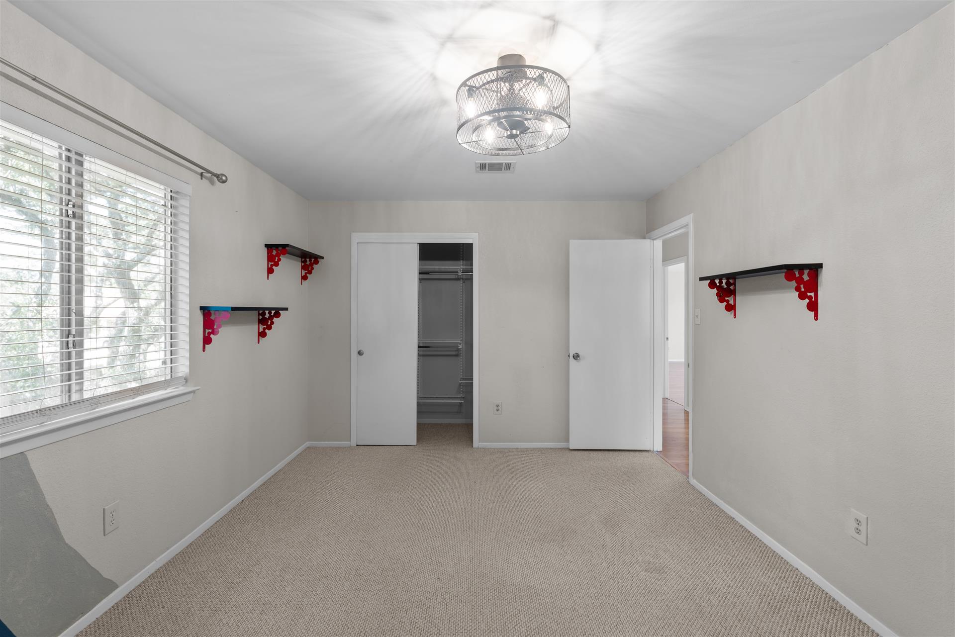 1710 Persimmon Road Cedar Park, TX 78613 - Photo 24 of 33 Secondary bedroom #1 offers ceiling fam and walk-in closet.