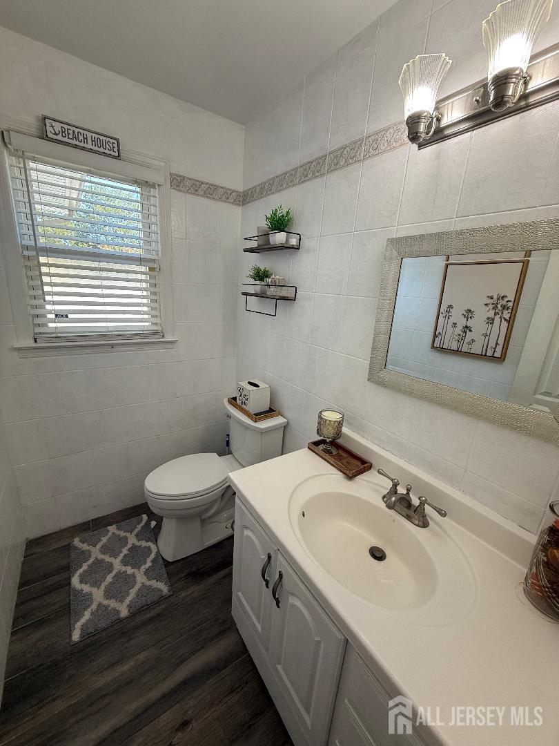 4 Davids Lane Howell, NJ 07731 - Photo 12 of 21 a bathroom with a double vanity sink and a mirror