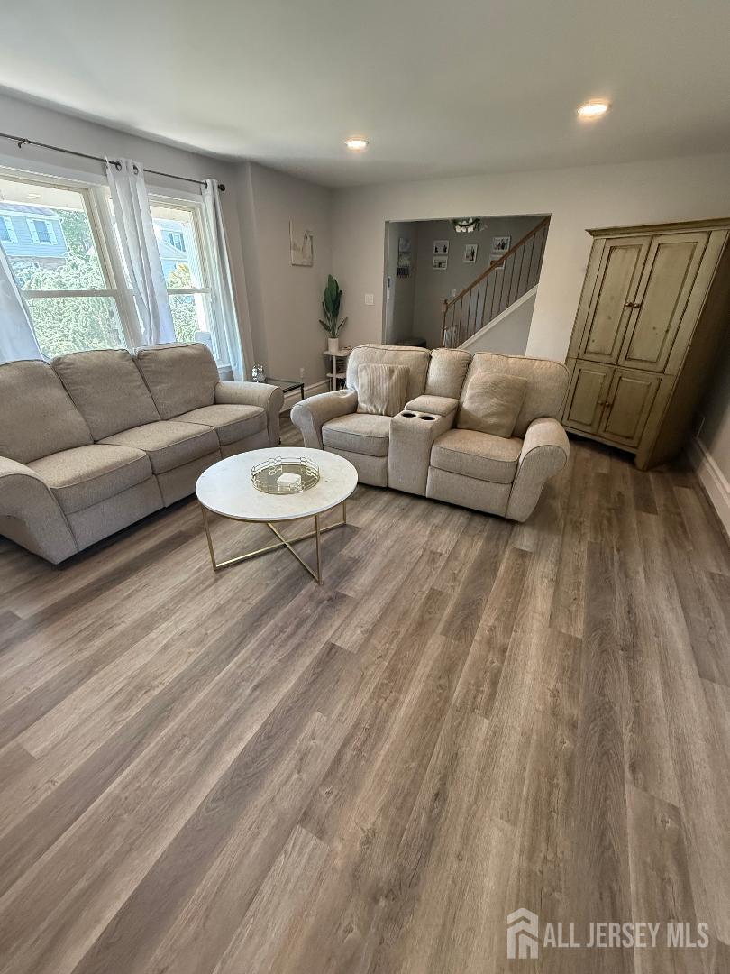 4 Davids Lane Howell, NJ 07731 - Photo 7 of 21 a living room with furniture and a wooden floor