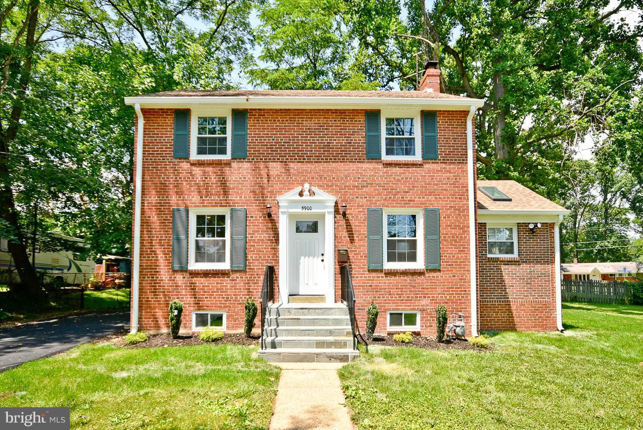 5900 Grayson Street Springfield, VA 22150 - Photo 2 of 30 a front view of a house with garden