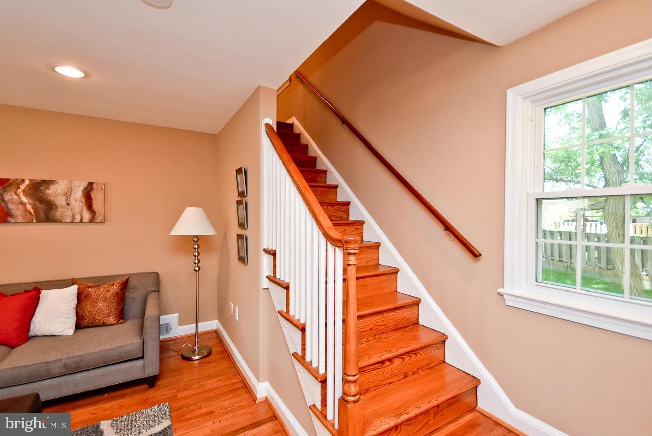 5900 Grayson Street Springfield, VA 22150 - Photo 13 of 30 a view of a livingroom with furniture and stairs