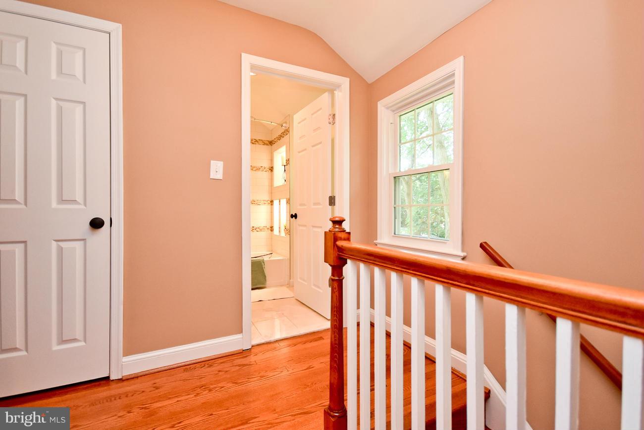 5900 Grayson Street Springfield, VA 22150 - Photo 15 of 30 a view of a porch with wooden floor