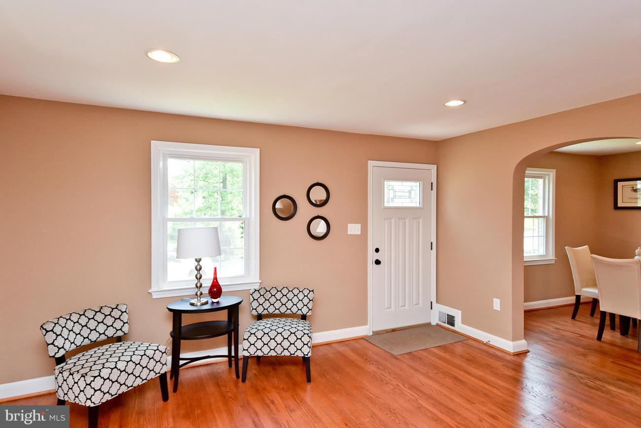 5900 Grayson Street Springfield, VA 22150 - Photo 3 of 30 a view of a livingroom with furniture and wooden floor