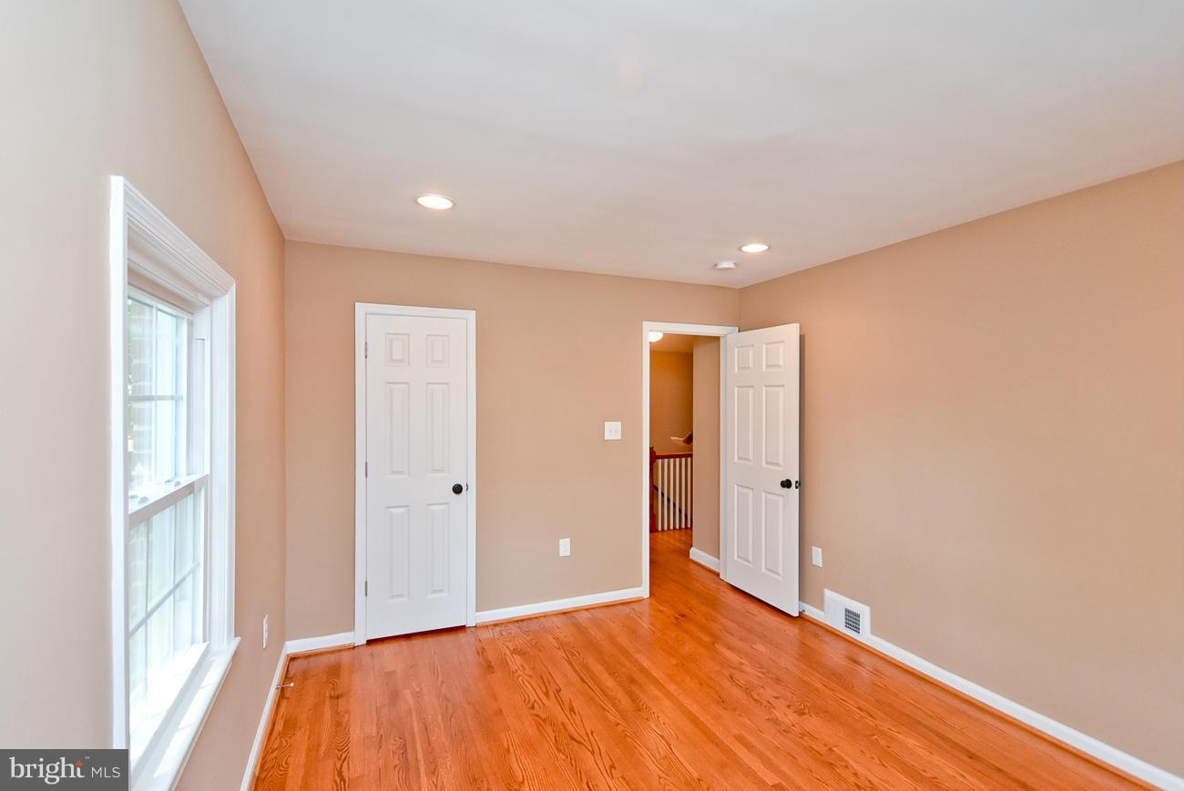 5900 Grayson Street Springfield, VA 22150 - Photo 21 of 30 a view of a livingroom with an empty space and a window