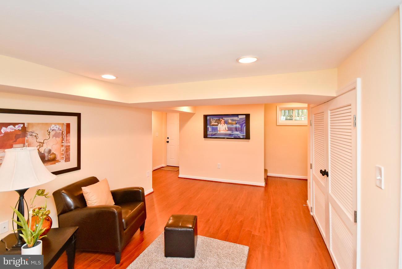 5900 Grayson Street Springfield, VA 22150 - Photo 23 of 30 a view of a livingroom with furniture and wooden floor