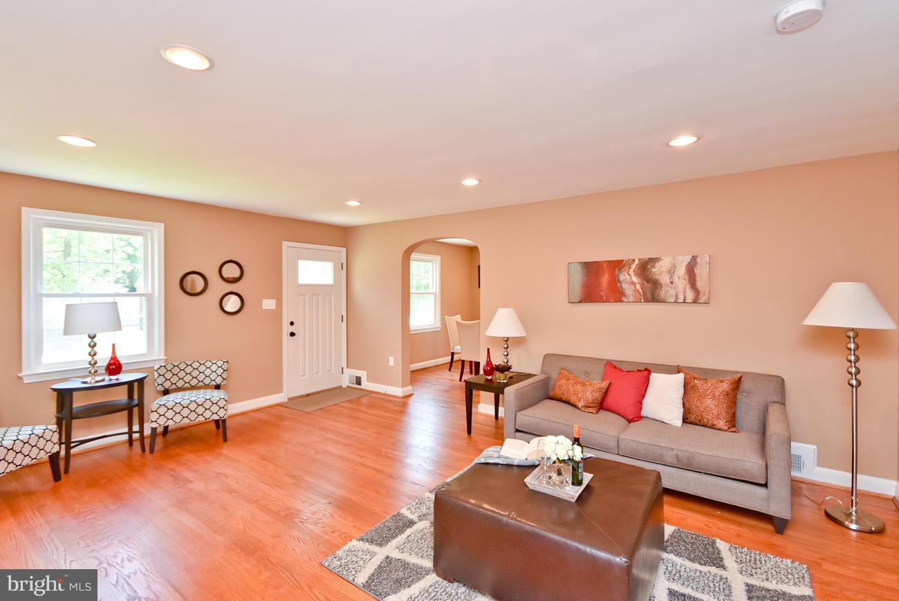 5900 Grayson Street Springfield, VA 22150 - Photo 4 of 30 a living room with furniture and wooden floor