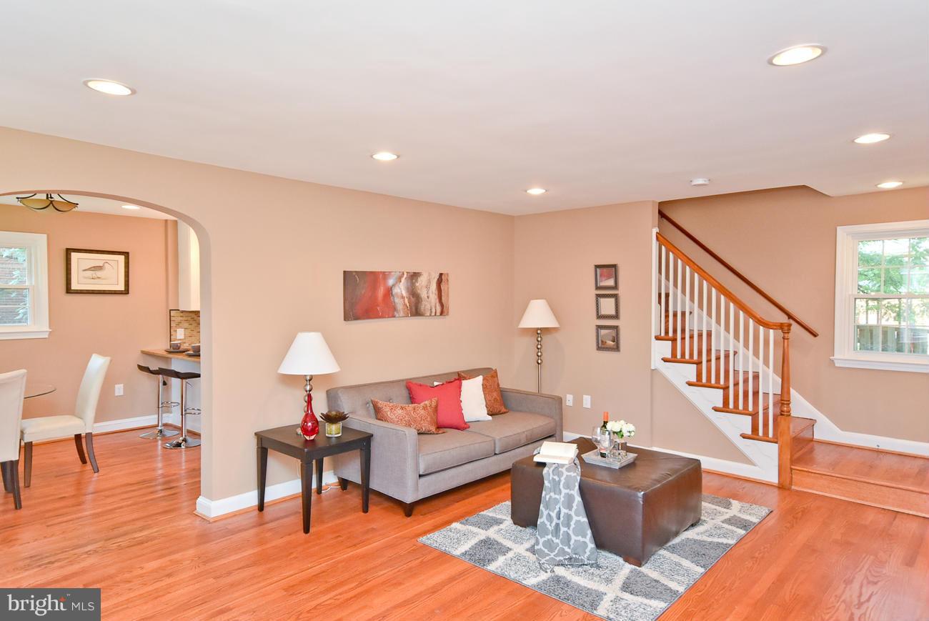5900 Grayson Street Springfield, VA 22150 - Photo 5 of 30 a living room with furniture and a wooden floor