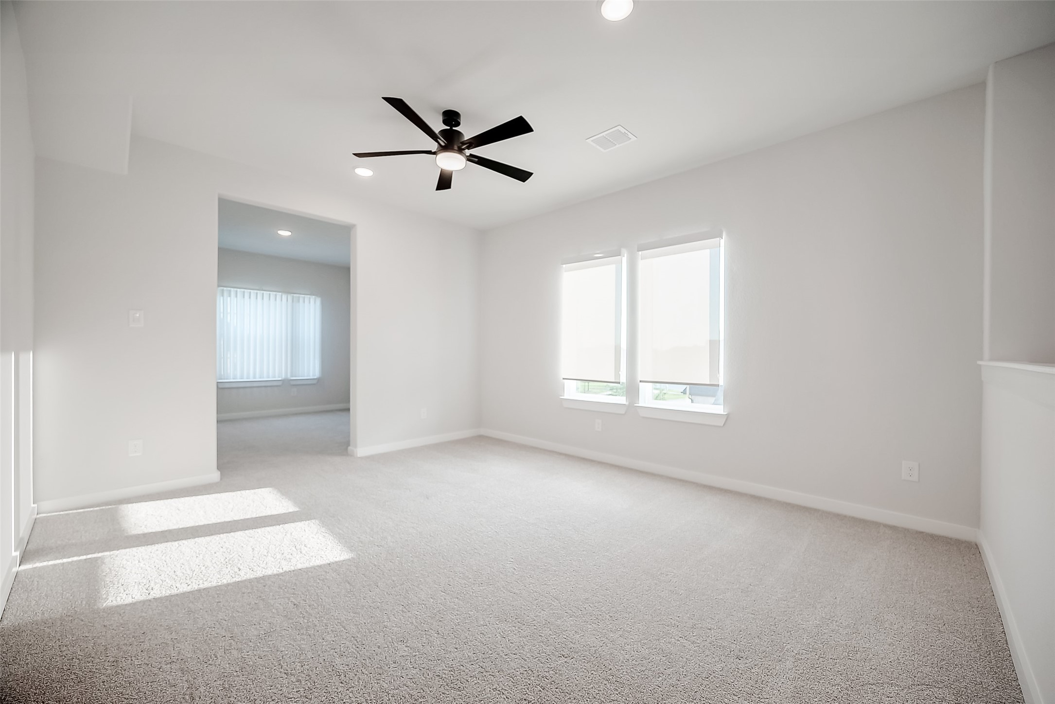 29022 Laurel Grove Lane Fulshear, TX 77441 - Photo 26 of 42 a view of an empty room with a window
