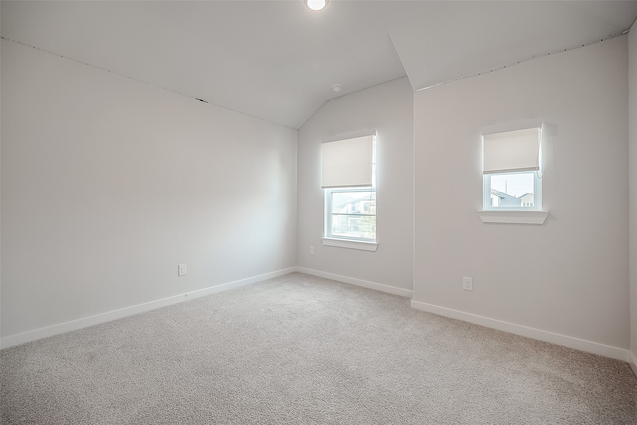 29022 Laurel Grove Lane Fulshear, TX 77441 - Photo 32 of 42 an empty room with a window