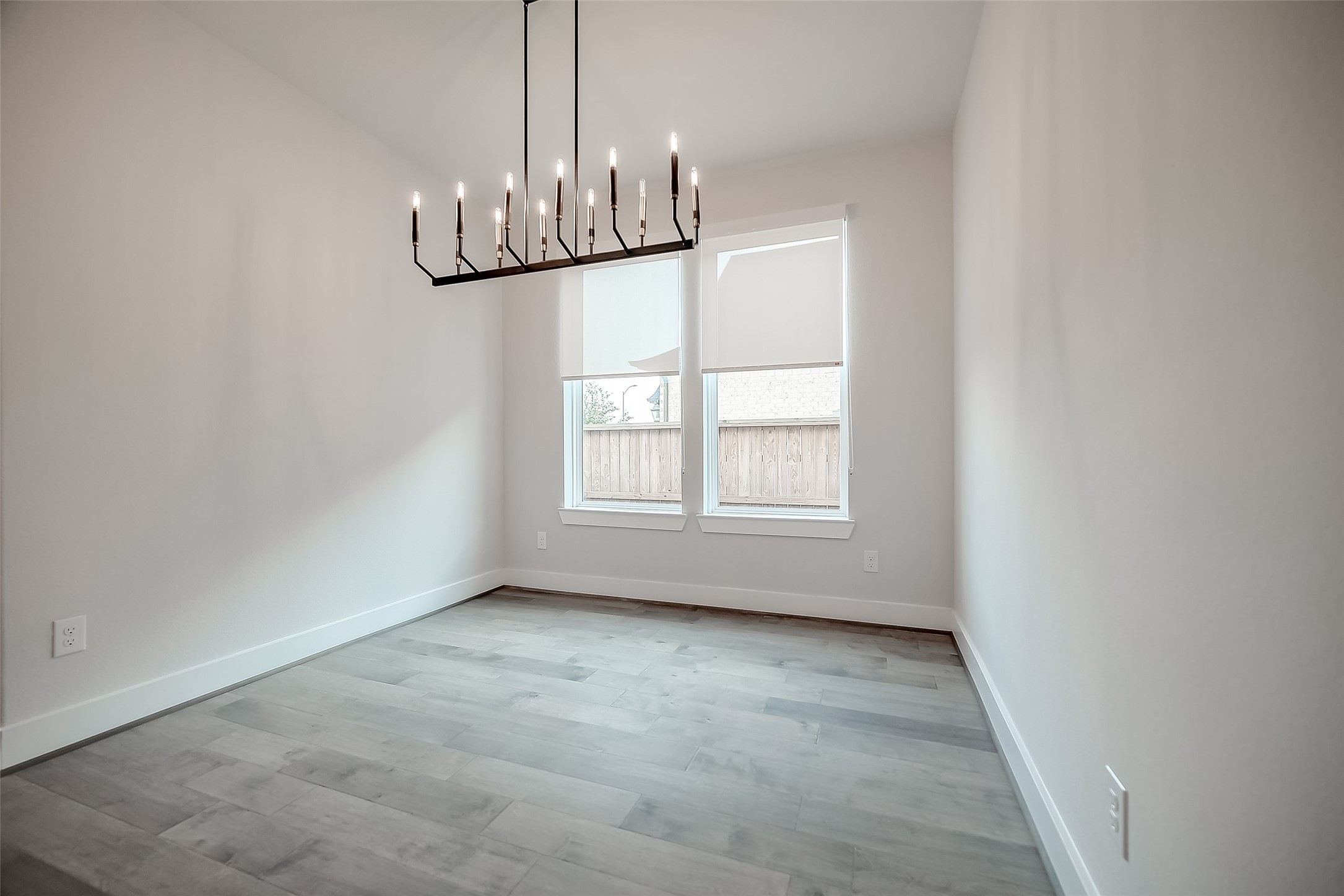 29022 Laurel Grove Lane Fulshear, TX 77441 - Photo 5 of 42 a view of an empty room with a window
