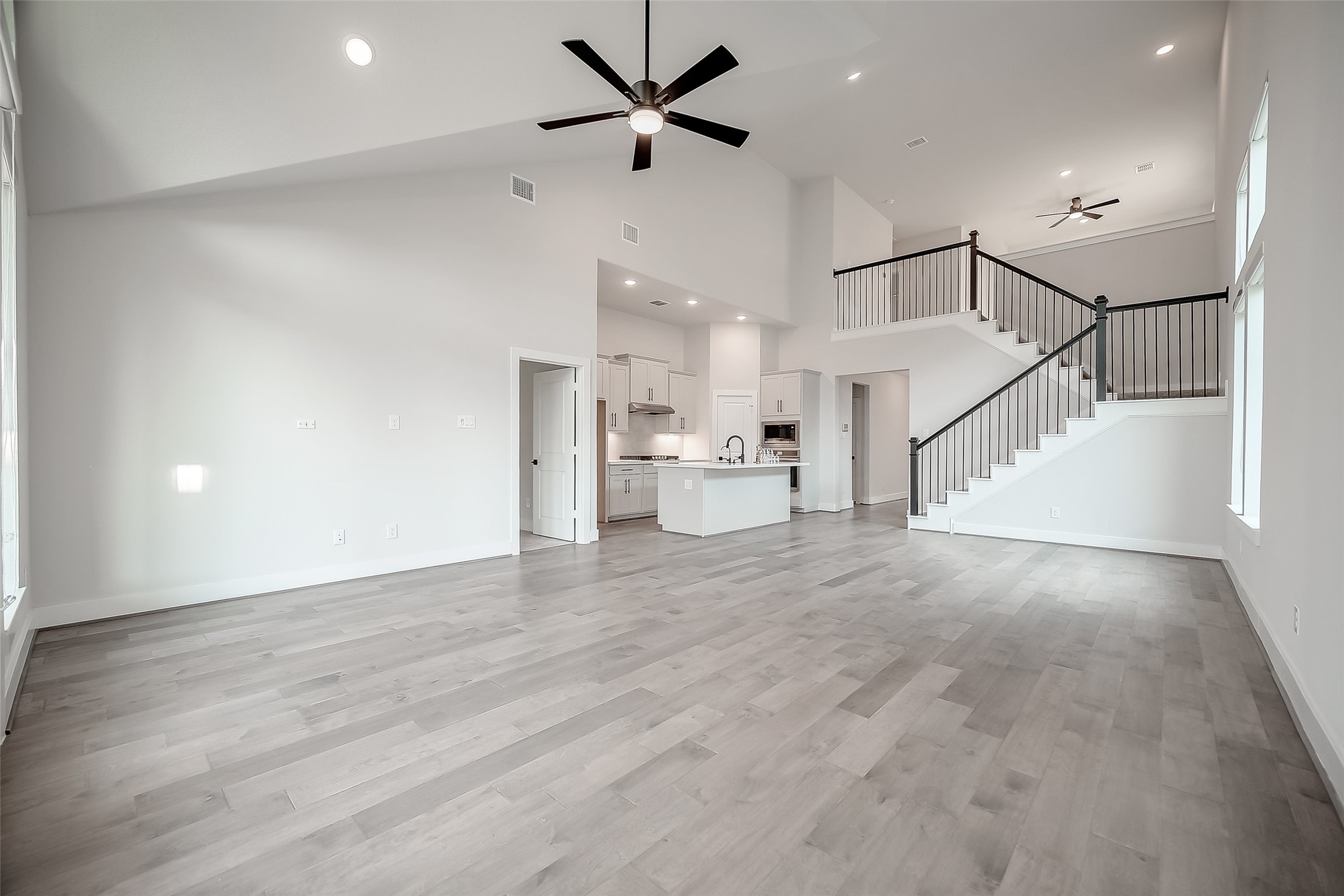 29022 Laurel Grove Lane Fulshear, TX 77441 - Photo 10 of 42 a view of an empty room and kitchen view