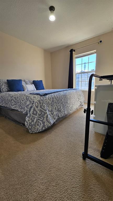 10193 Ridgebloom Avenue Orlando, FL 32829 - Photo 14 of 41 a living room with furniture