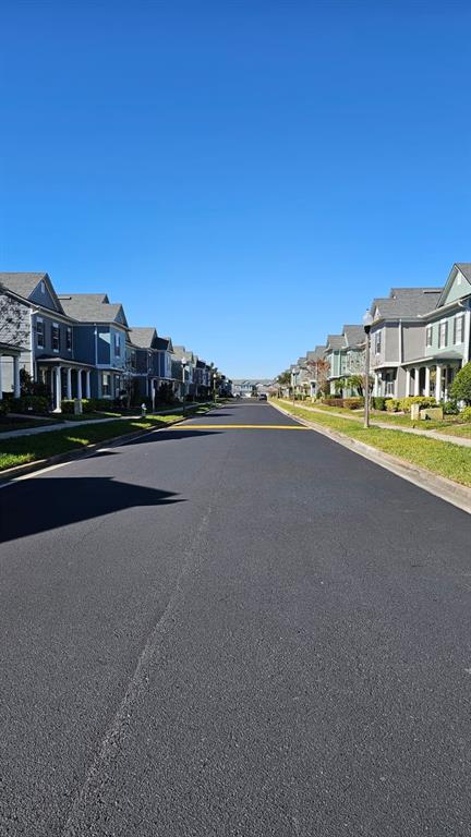 10193 Ridgebloom Avenue Orlando, FL 32829 - Photo 33 of 41 a view of a city with tall buildings