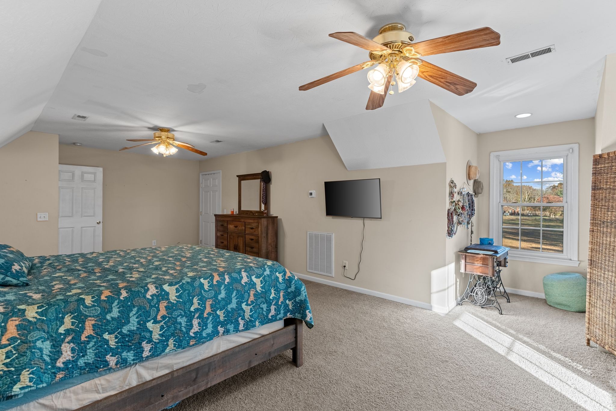 3736 Armstrong Road Springfield, TN 37172 - Photo 26 of 60 a bedroom with a bed and a chandelier