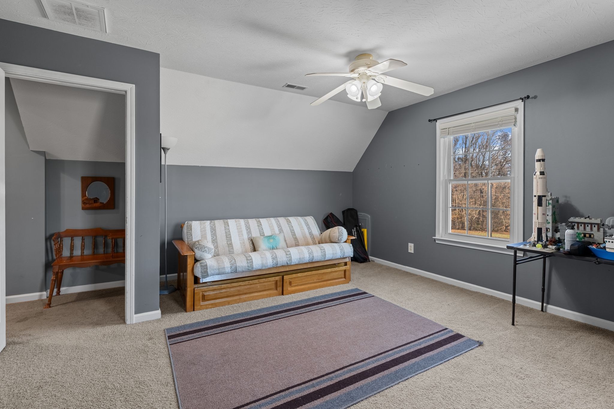 3736 Armstrong Road Springfield, TN 37172 - Photo 29 of 60 a living room with furniture and a chandelier
