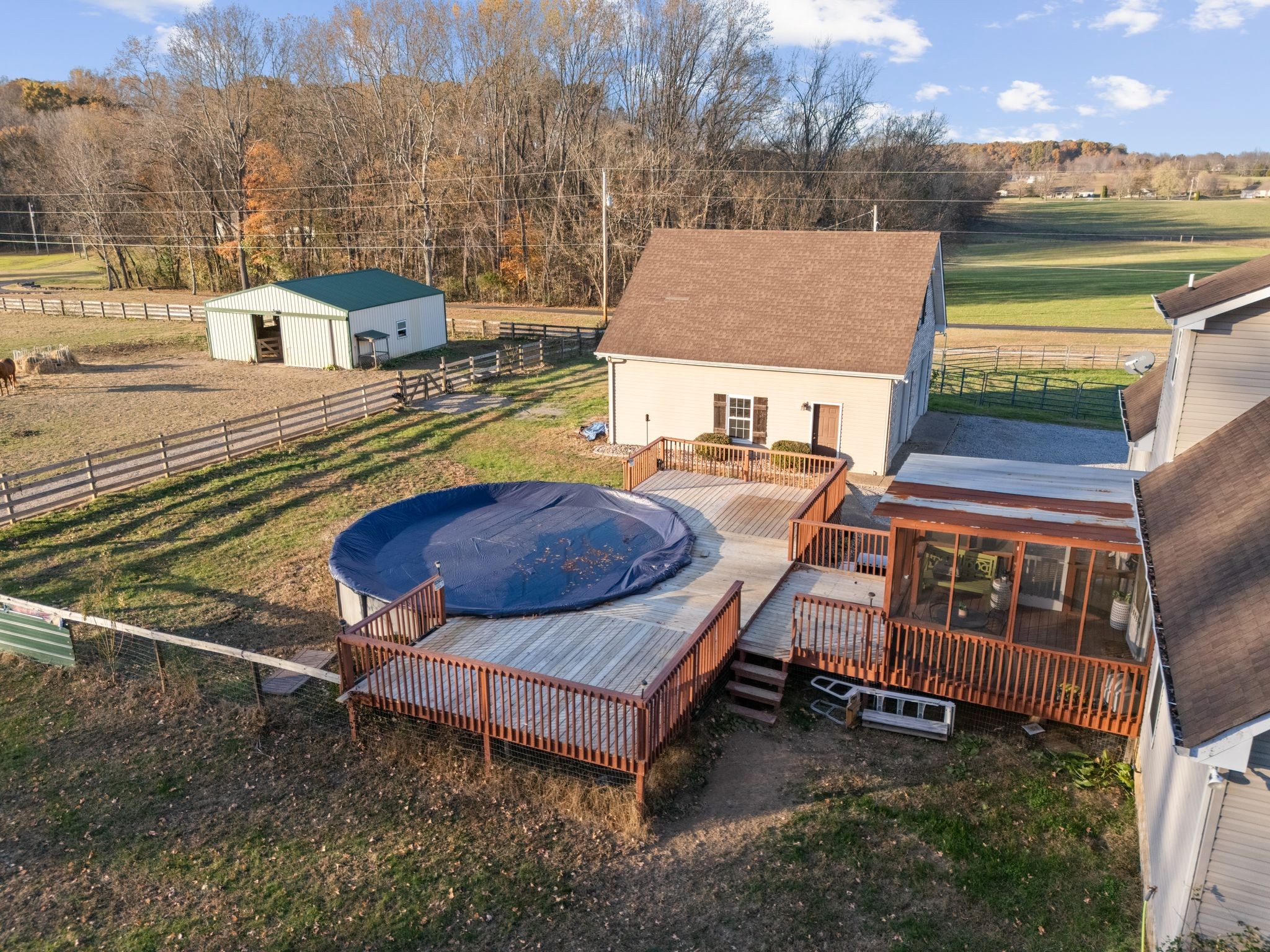 3736 Armstrong Road Springfield, TN 37172 - Photo 34 of 60 a view of a swimming pool with a lounge chairs