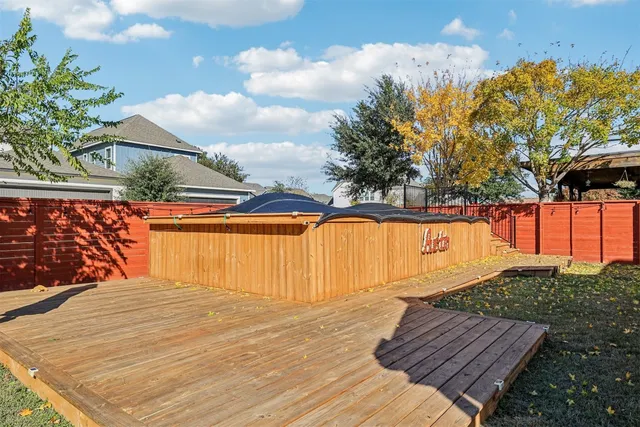 a view of swimming pool with lounge chair
