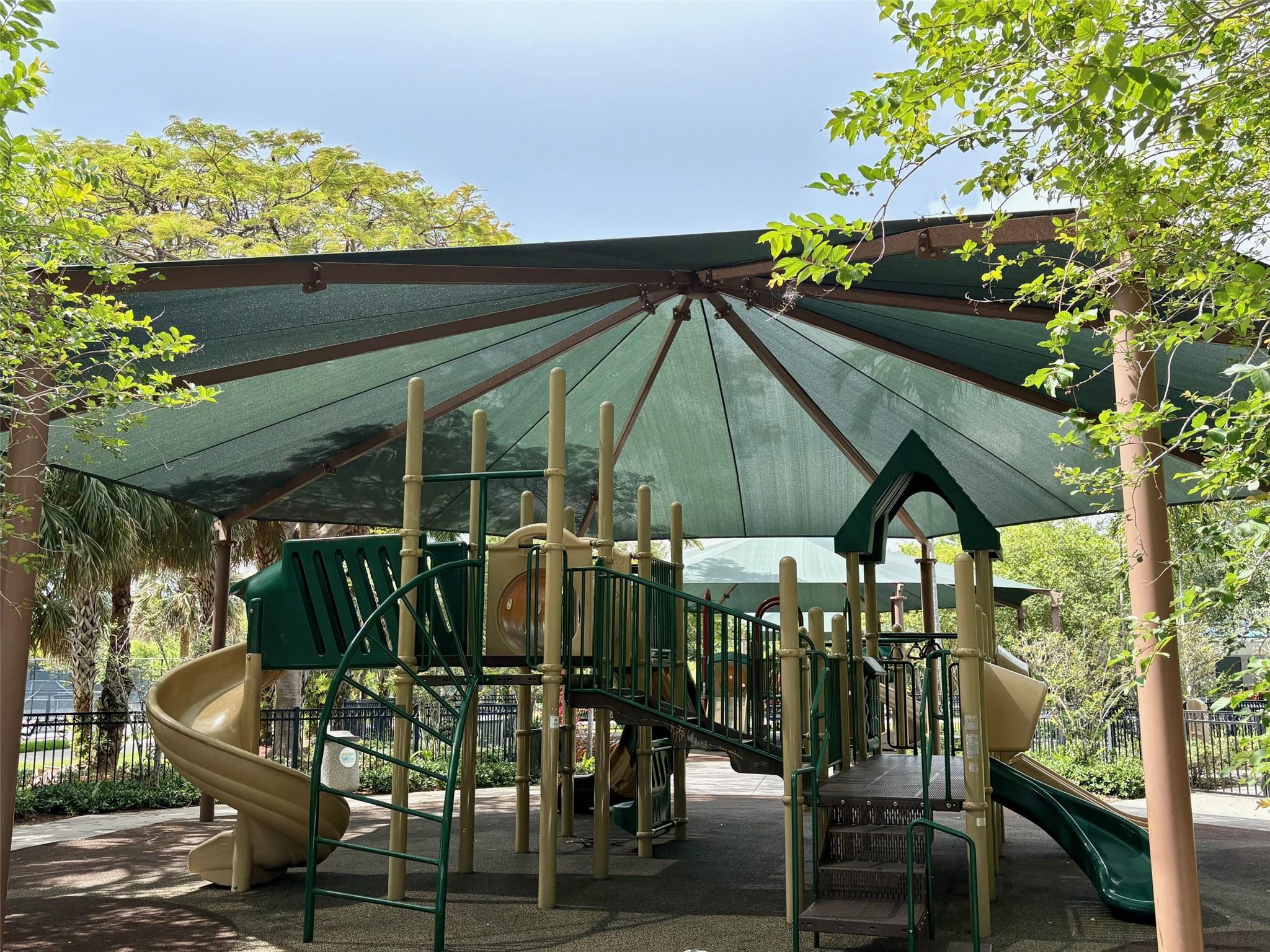 2671 South Course Drive, Unit 108 Pompano Beach, FL 33069 - Photo 30 of 40 an outdoor space with furniture