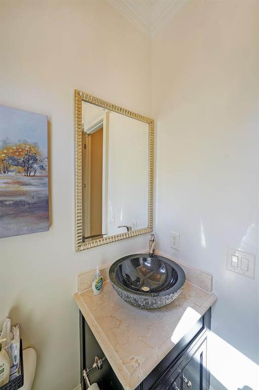 9062 Riverbend Manor Alpharetta, GA 30022 - Photo 16 of 36 a bathroom with a sink and a mirror
