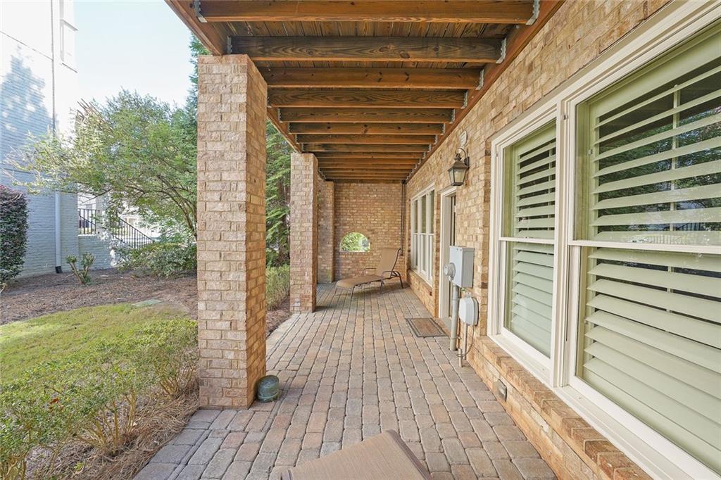 9062 Riverbend Manor Alpharetta, GA 30022 - Photo 31 of 36 a view of a porch with wooden floor