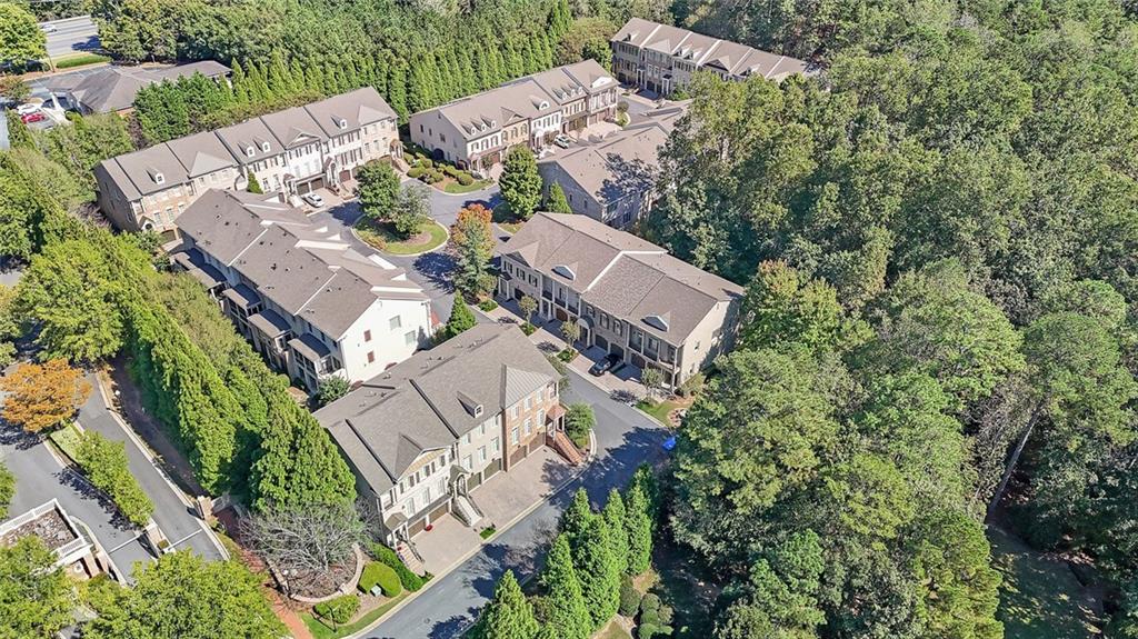 9062 Riverbend Manor Alpharetta, GA 30022 - Photo 35 of 36 an aerial view of residential house with outdoor space and trees all around