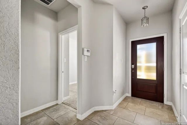 a view of an entryway and a hallway