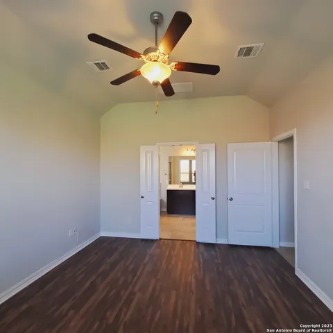 a view of a livingroom with wooden floor