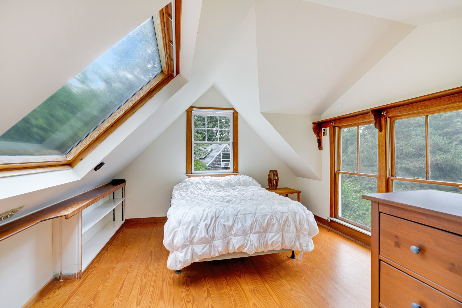 174 Middle Road Chilmark, MA 02535 - Photo 33 of 40 a bedroom with a bed and a large window with outer view