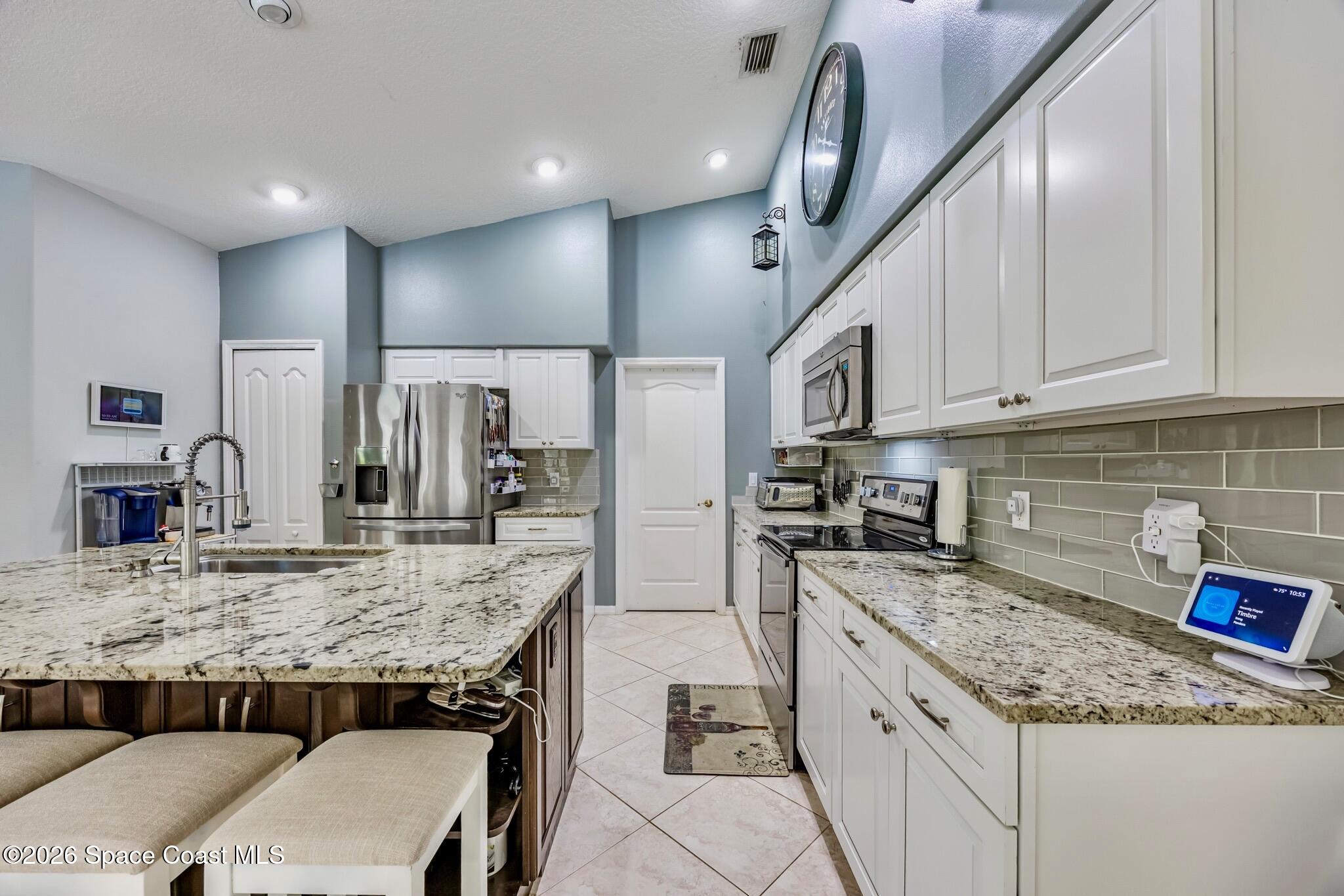 904 Bryce Lane Melbourne, FL 32904 - Photo 17 of 32 kitchen 2