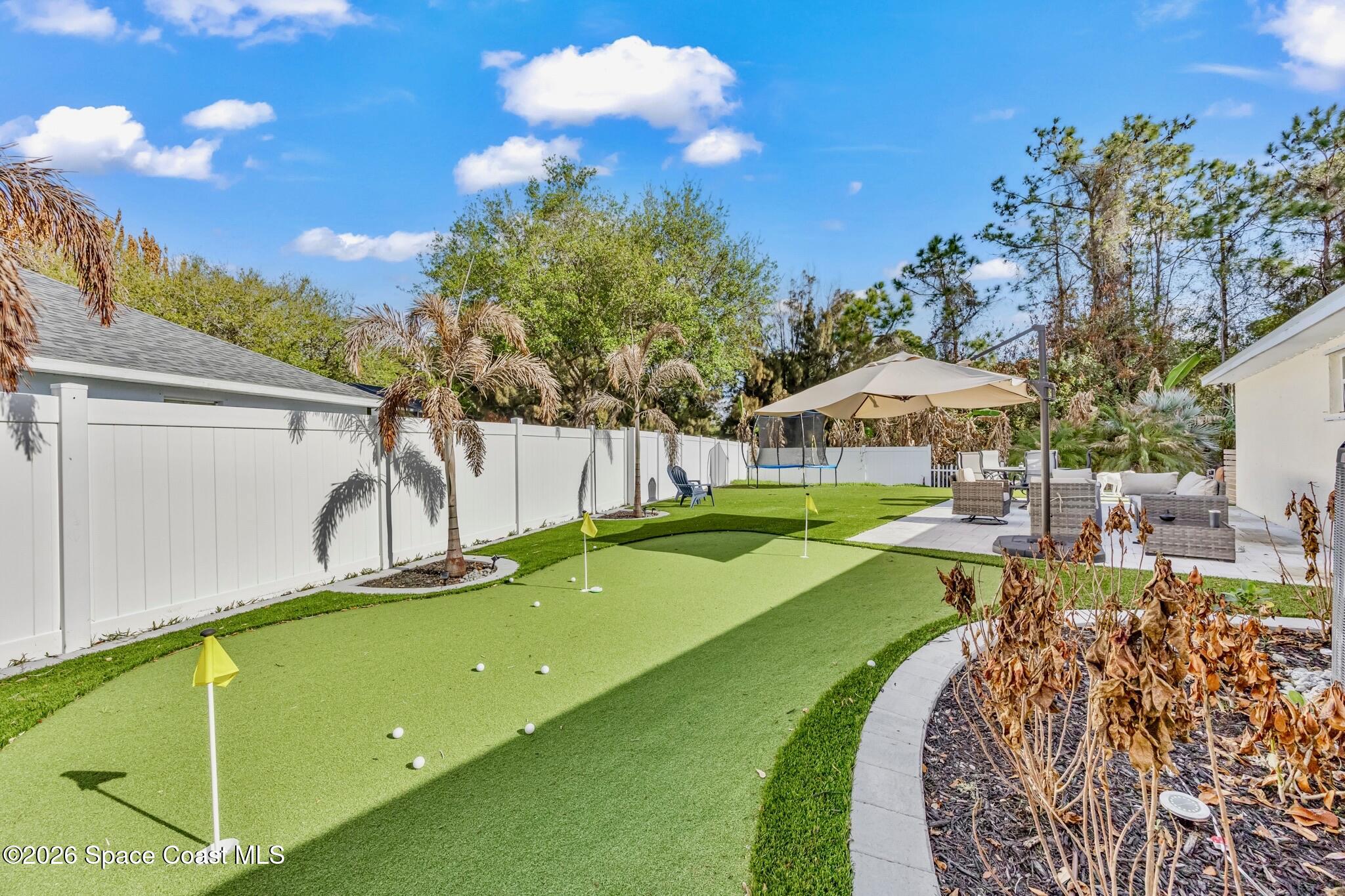 904 Bryce Lane Melbourne, FL 32904 - Photo 31 of 32 putting green 1