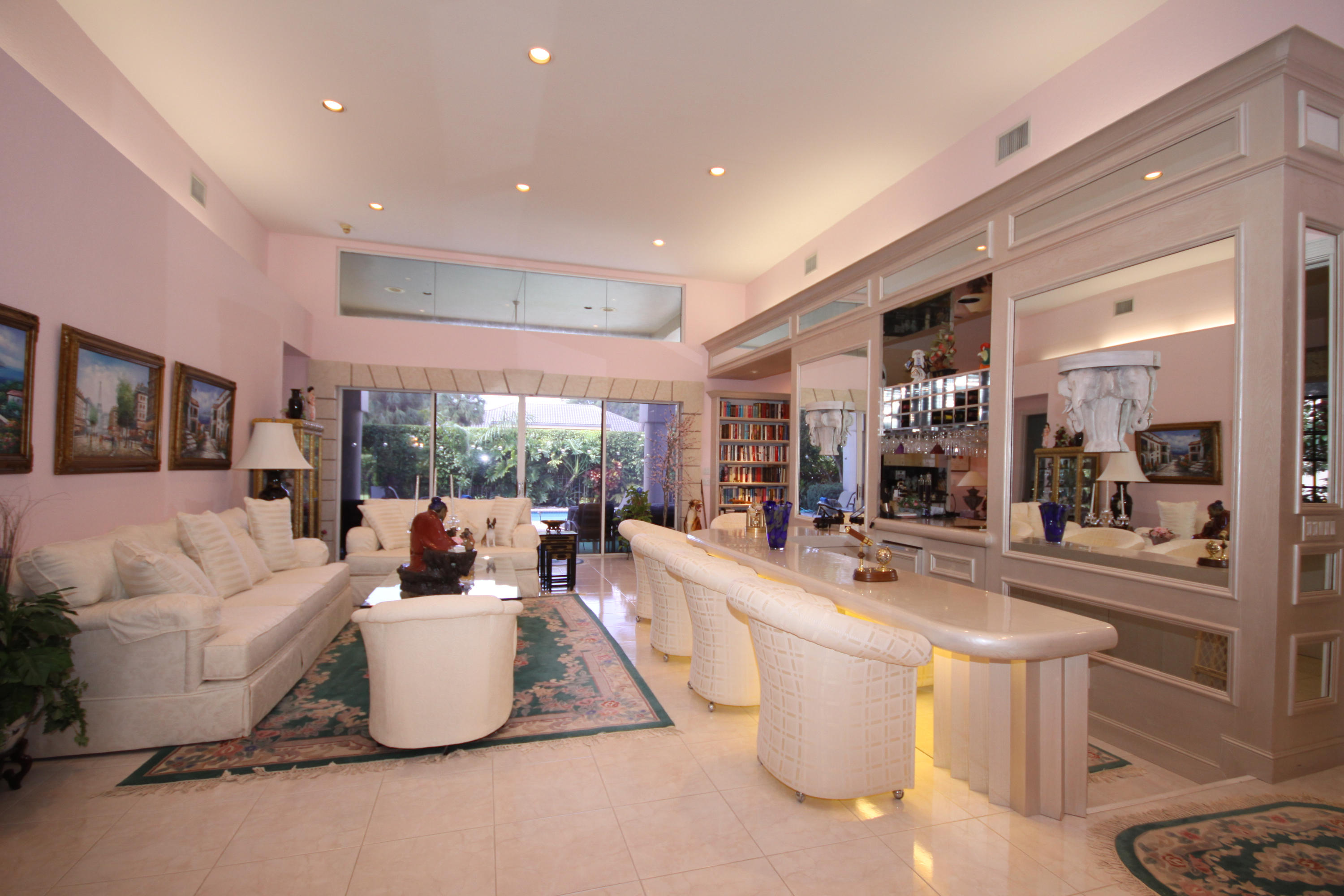 2264 Northwest 60th Street Boca Raton, FL 33496 - Photo 6 of 19 a dining room with furniture and a large window
