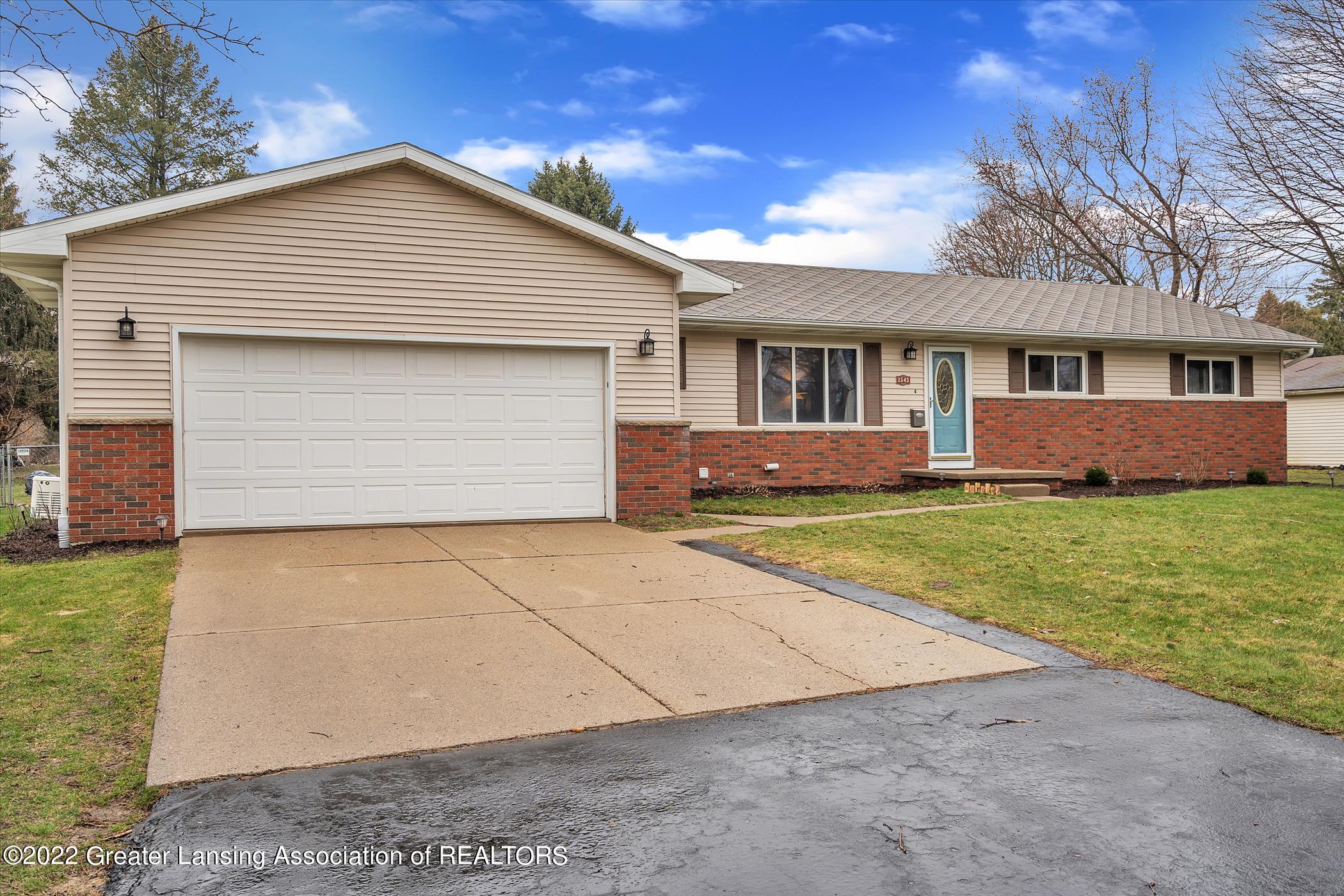 1545 East Stoll Road Lansing, MI 48906 - Photo 2 of 37 1545-E-Stoll-Rd-WindowStill-Real-Estate-