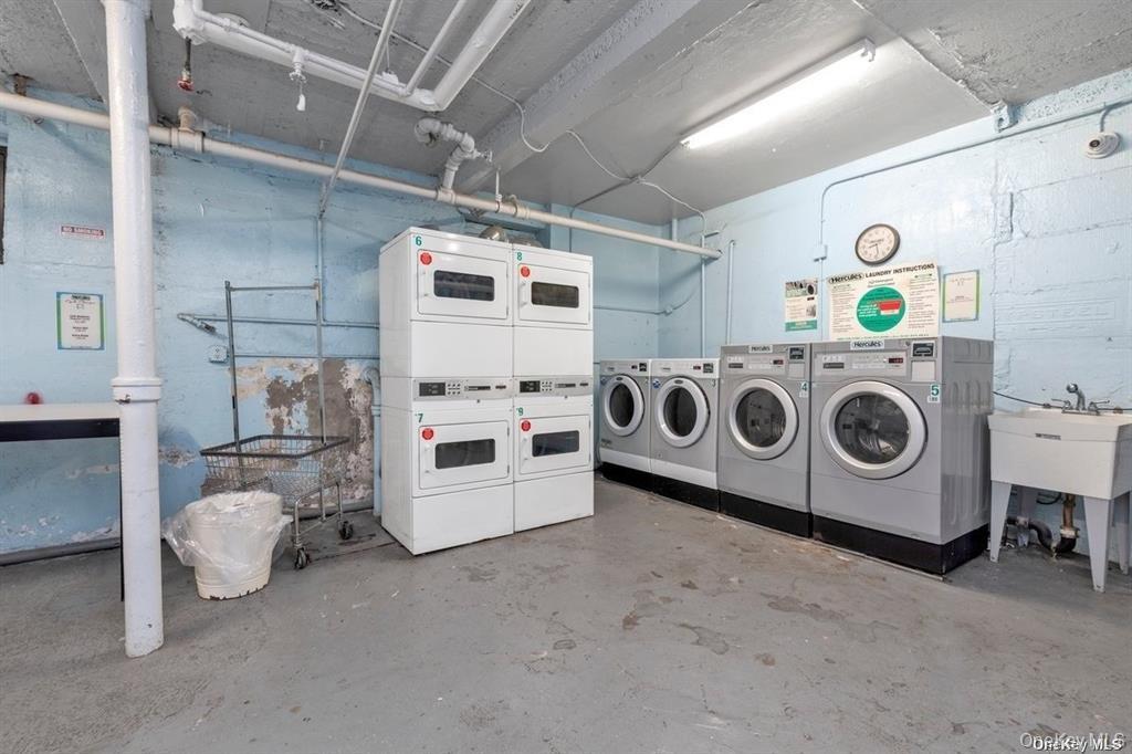 43-33 48th Street, Unit 4H Queens, NY 11104 - Photo 13 of 14 a utility room with dryer and washer