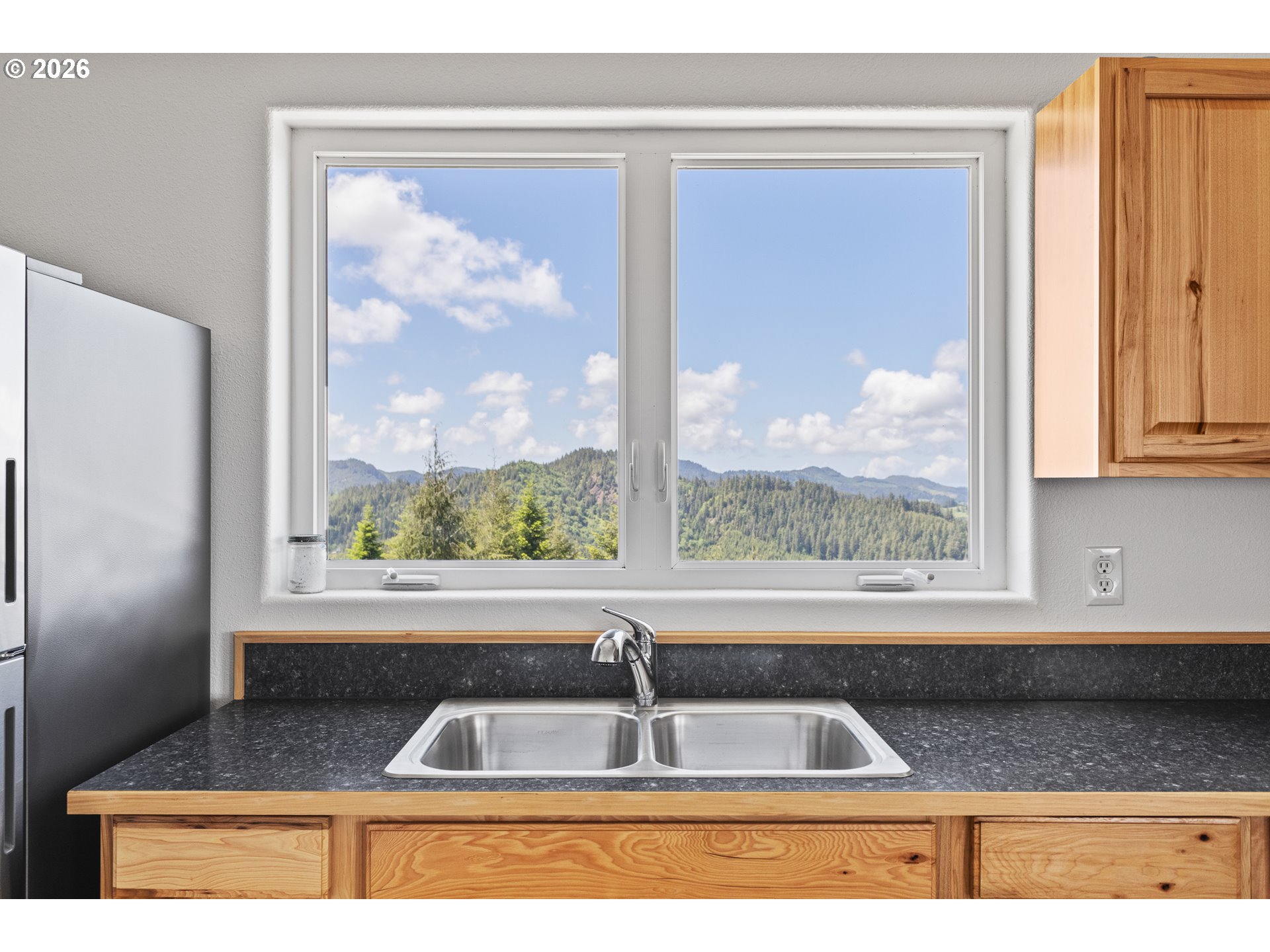 46345 Dement Creek Road Broadbent, OR 97414 - Photo 16 of 47 a sink sitting next to a window