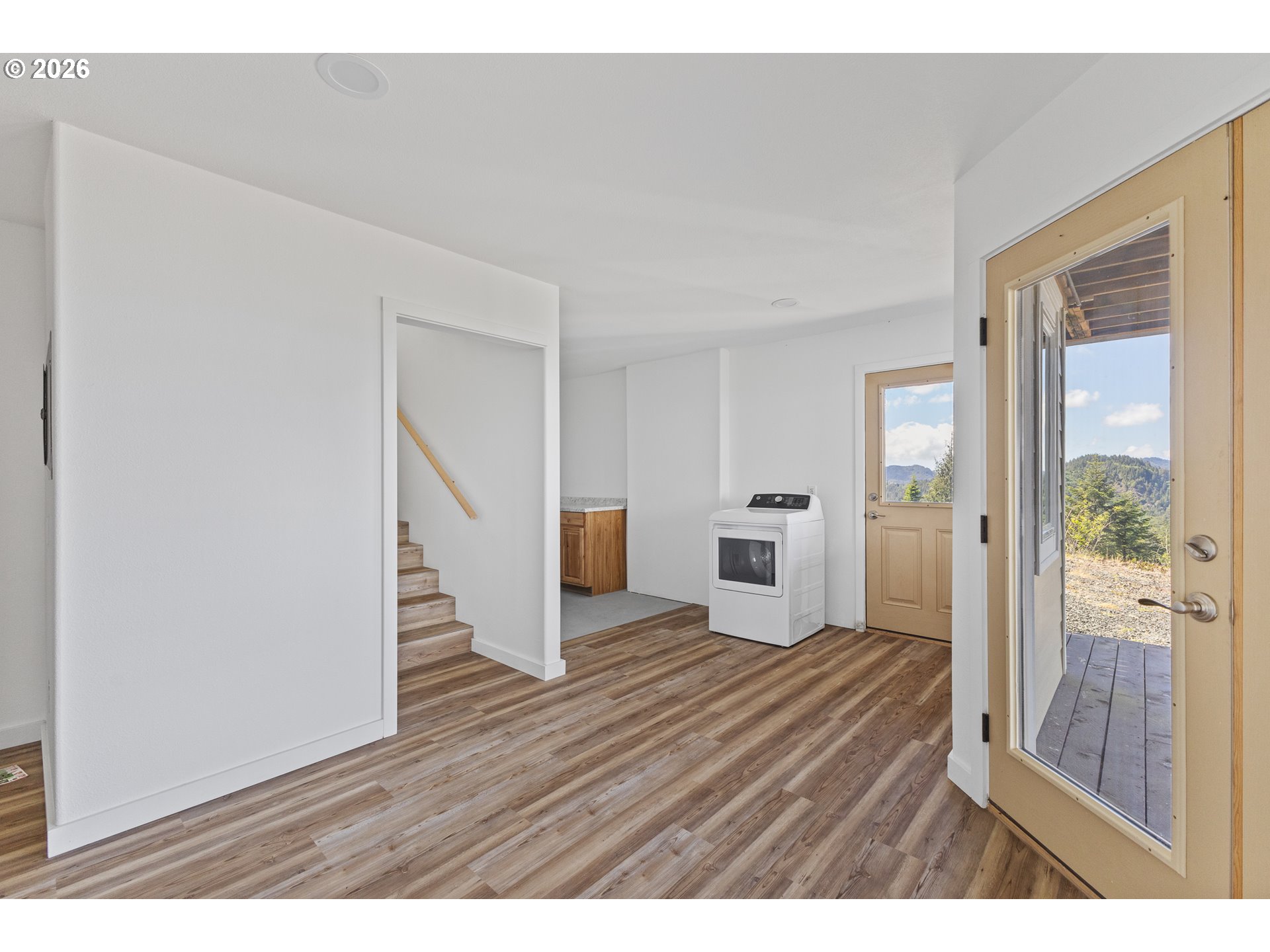 46345 Dement Creek Road Broadbent, OR 97414 - Photo 29 of 47 a view interior of a house with wooden floor and windows