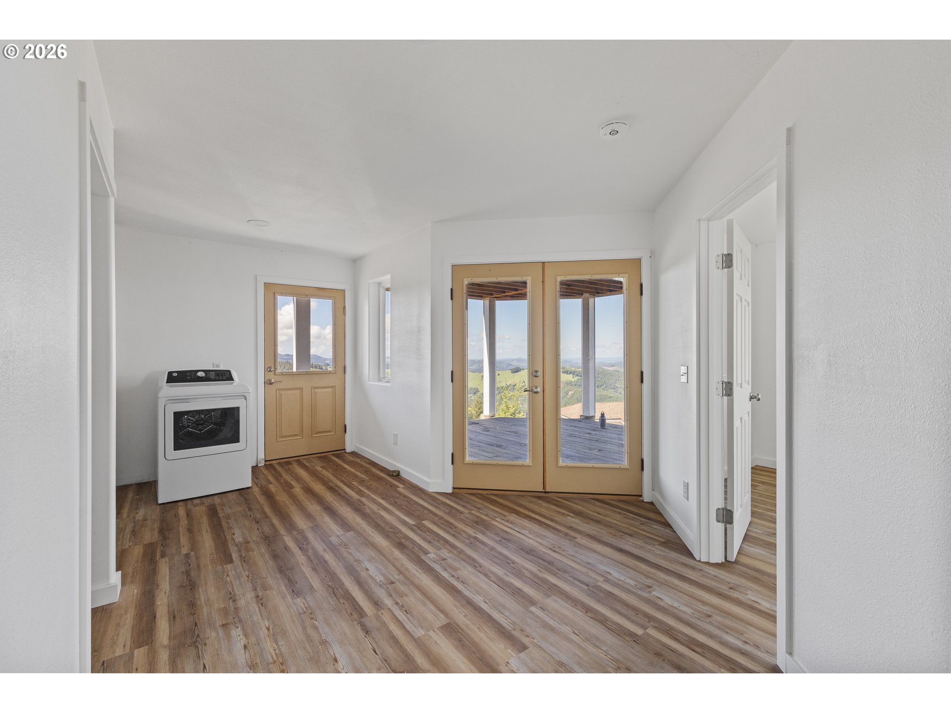 46345 Dement Creek Road Broadbent, OR 97414 - Photo 33 of 47 a view interior of a house with wooden floor and windows