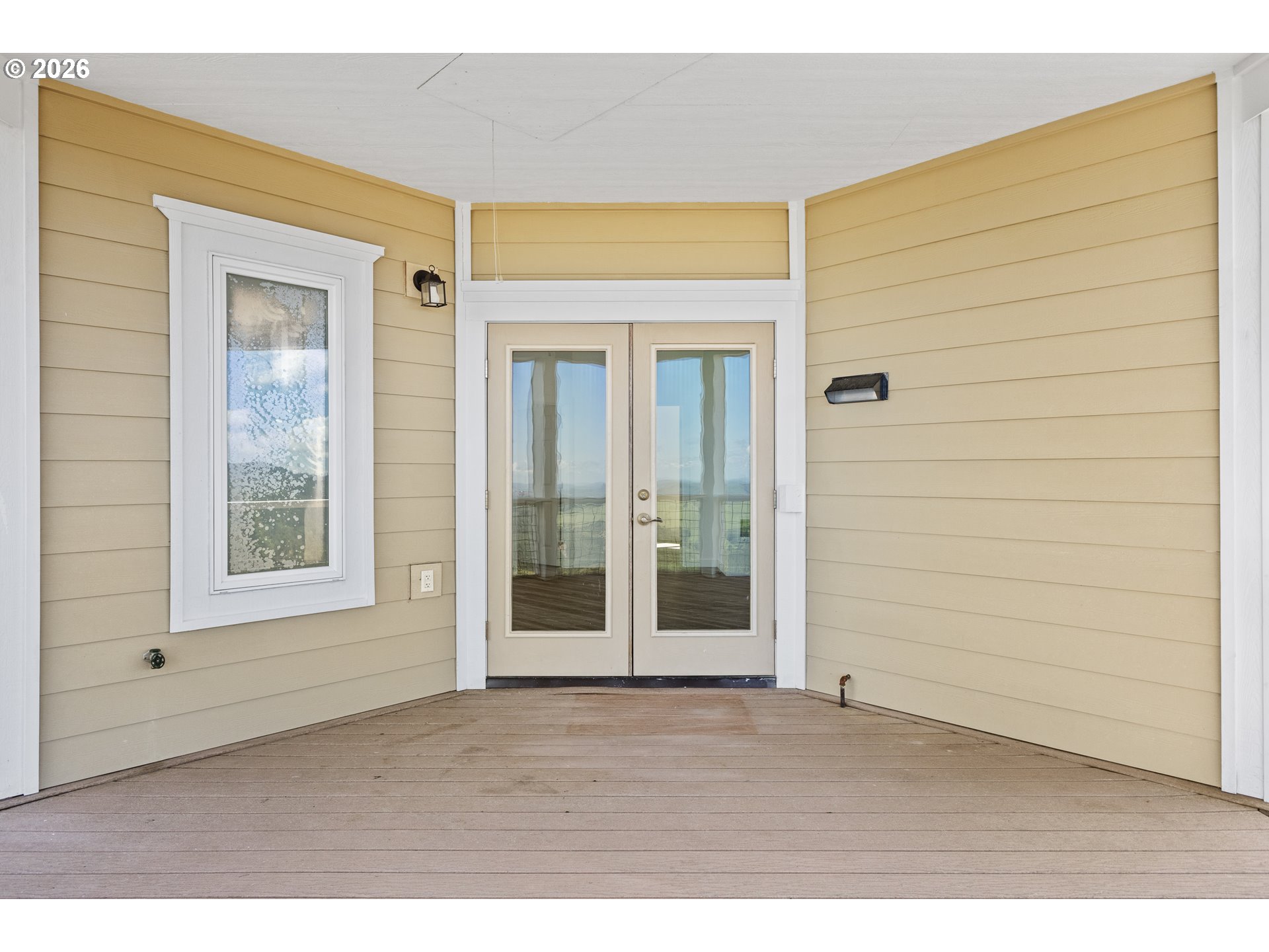 46345 Dement Creek Road Broadbent, OR 97414 - Photo 39 of 47 a view of an empty room with wooden floor and a window