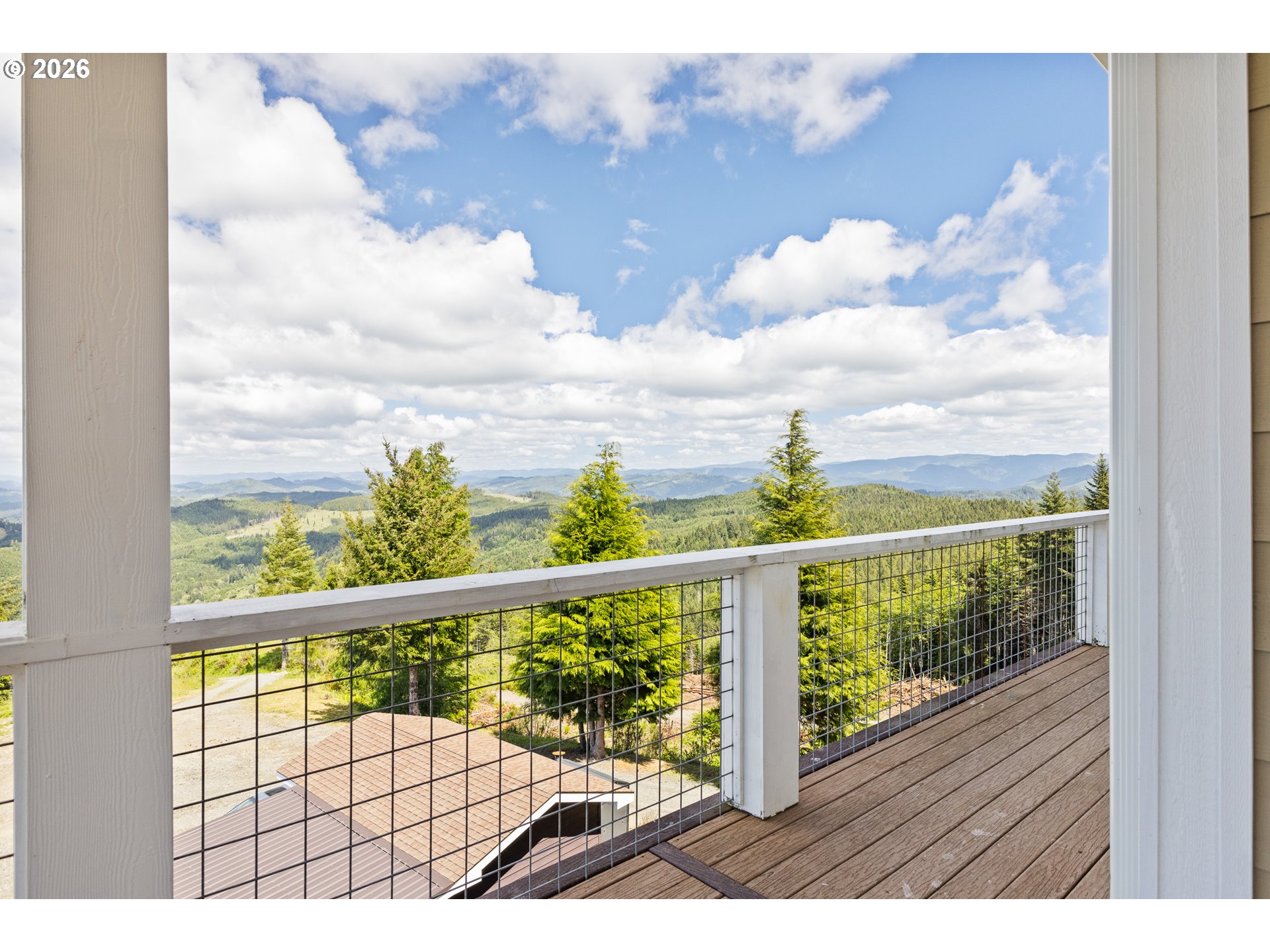 46345 Dement Creek Road Broadbent, OR 97414 - Photo 40 of 47 a view of a balcony with wooden floor
