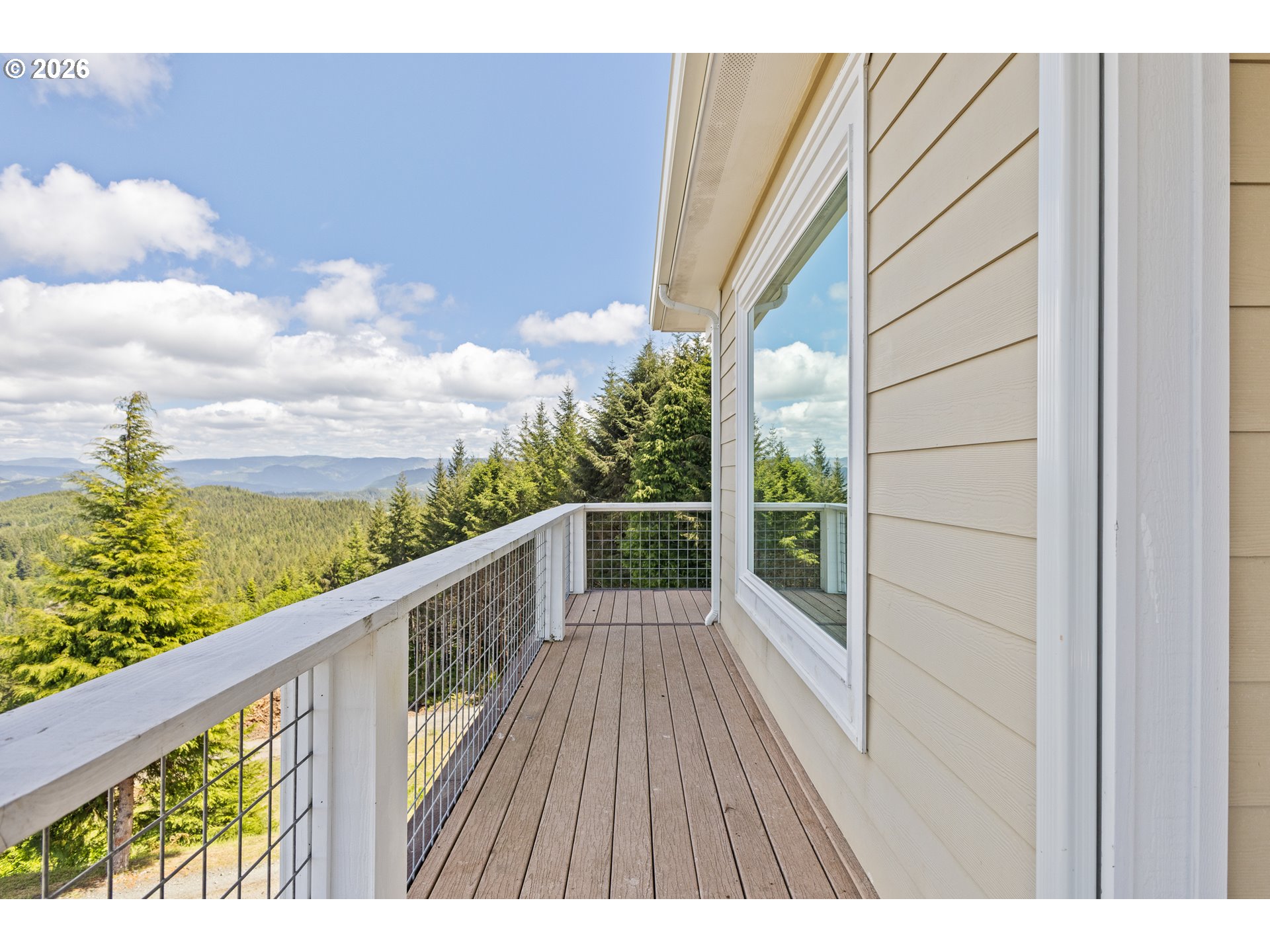 46345 Dement Creek Road Broadbent, OR 97414 - Photo 41 of 47 a view of balcony with wooden floor