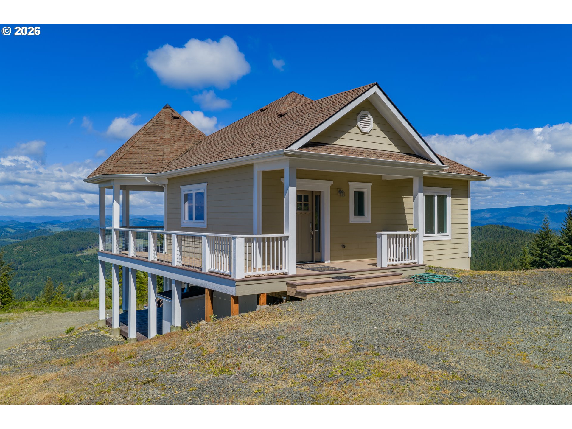 46345 Dement Creek Road Broadbent, OR 97414 - Photo 5 of 47 a view of a house with a yard and potted plants