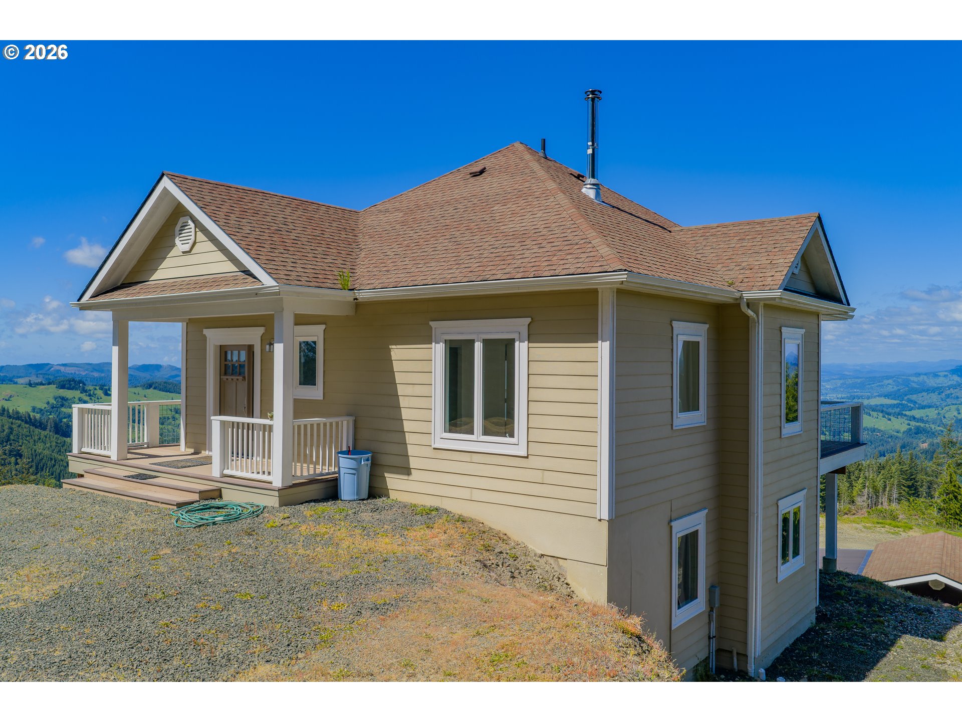 46345 Dement Creek Road Broadbent, OR 97414 - Photo 6 of 47 a view of a house with a yard