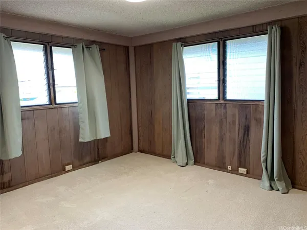 wooden floor and windows in an empty room