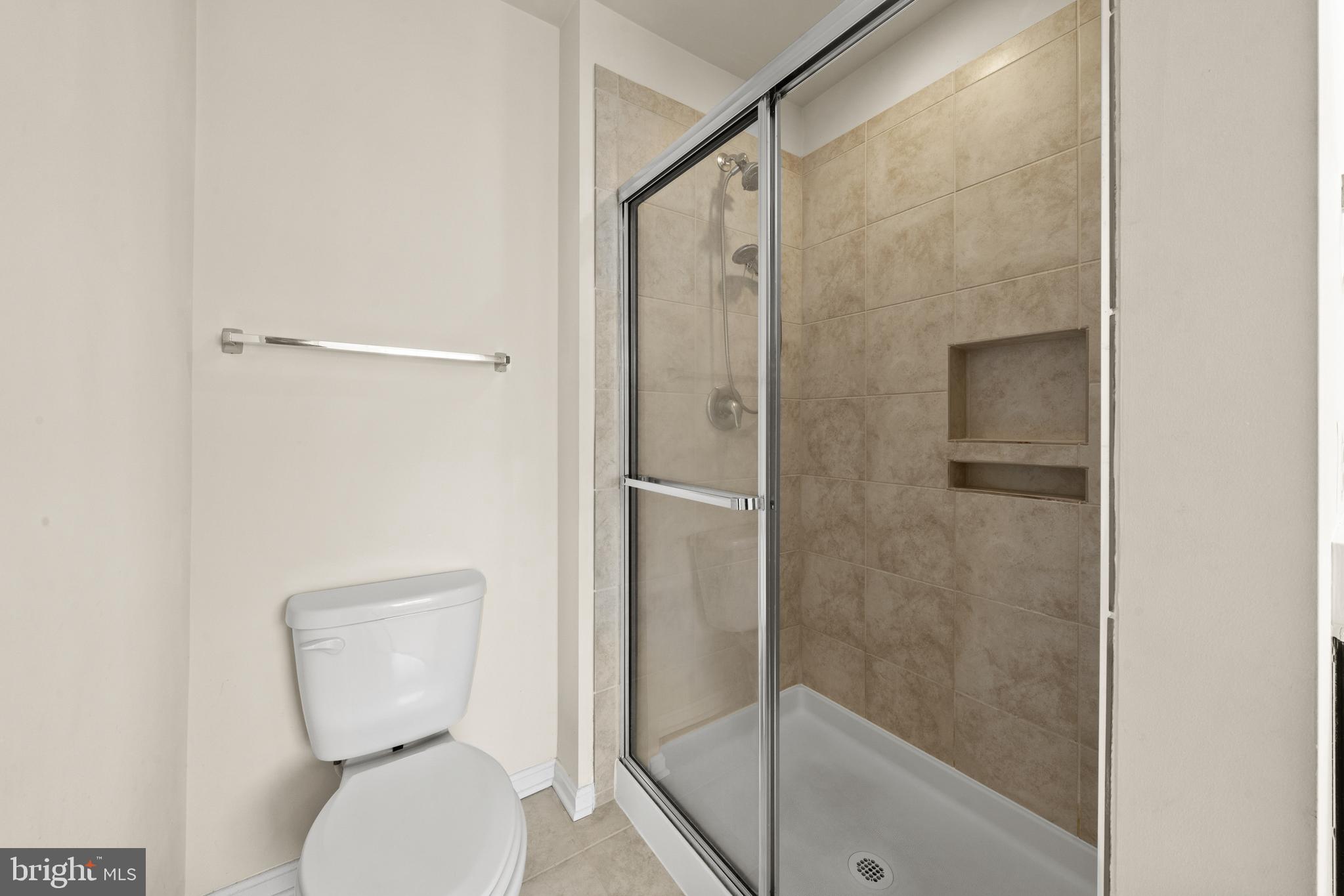 4733 Cambria Road Frederick, MD 21703 - Photo 20 of 32 Second full bathroom with tile