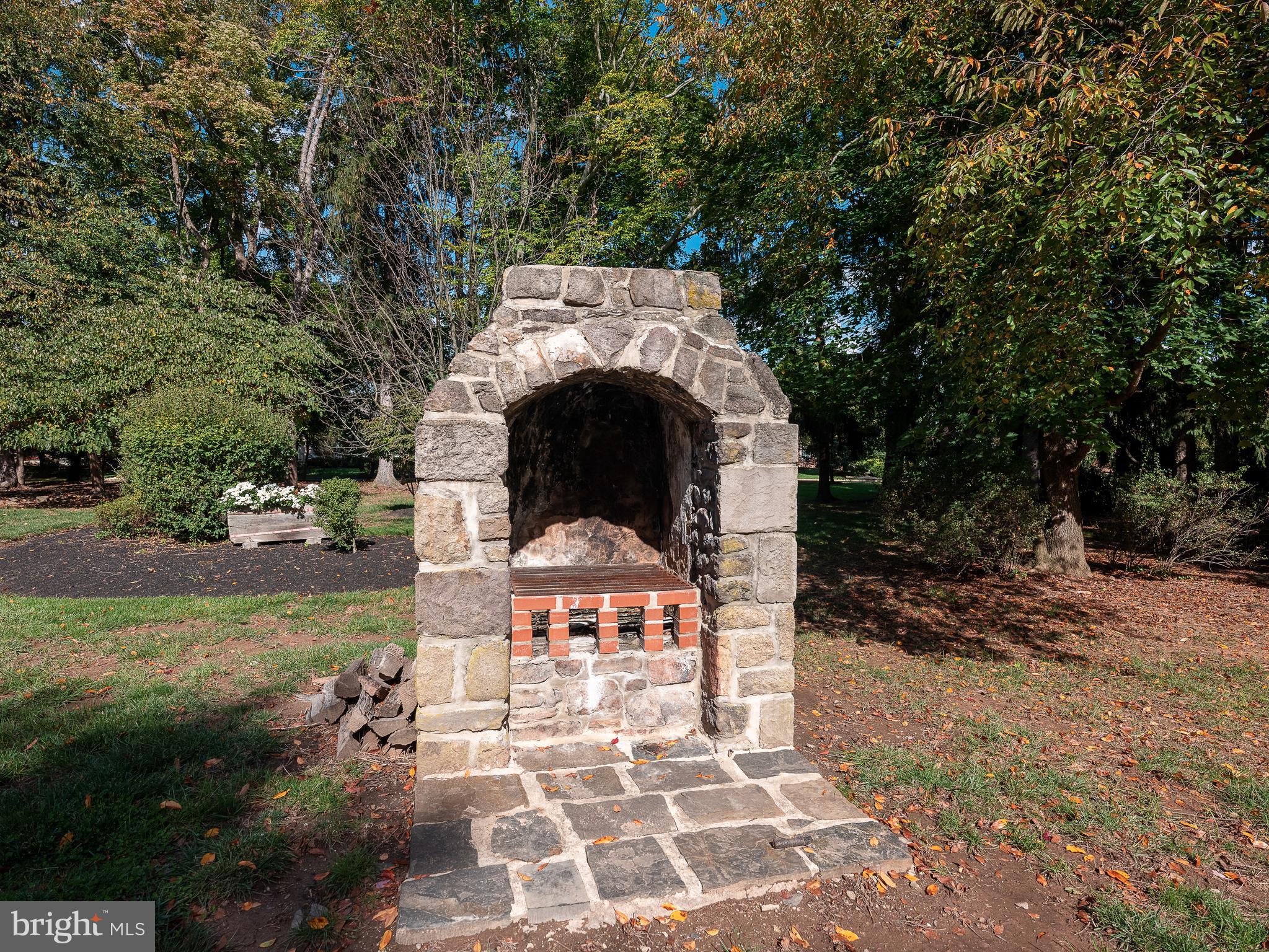 3 Belmont Way Holland, PA 18966 - Photo 70 of 82 Stone fireplace in the backyard