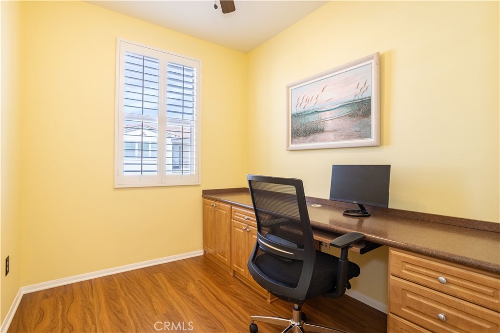 20335 Paseo Meriana Porter Ranch, CA 91326 - Photo 20 of 58 Versatile loft with plantation shutters and ceiling fan is ideal for a home office and separates the bedrooms