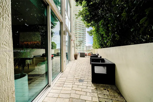 a spacious bedroom with a bed and furniture