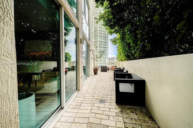 a spacious bedroom with a bed and furniture