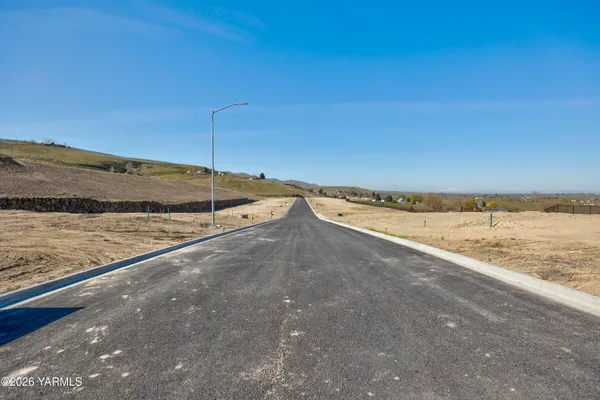 a view of an ocean and mountain