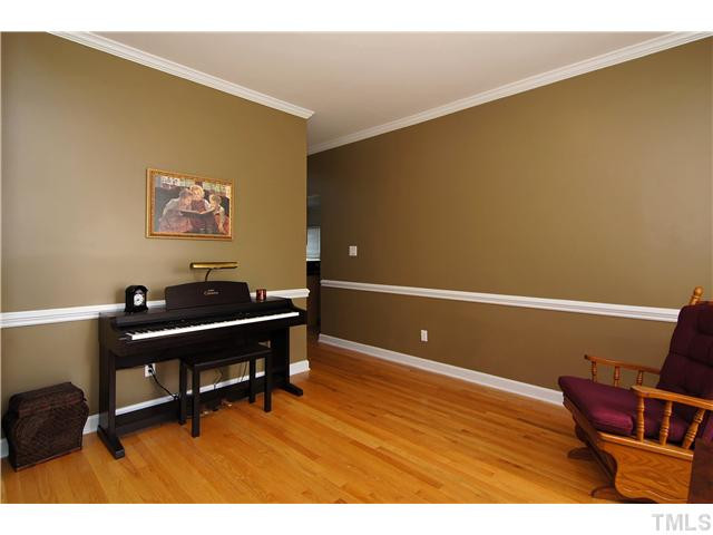 114 Jersey Ridge Road Cary, NC 27518 - Photo 8 of 21 The beautiful dining room also works well ans a music room or a formal living area. Dining Room